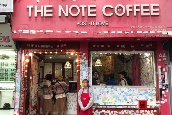 The walls covered in notes at The Note Coffee in Hanoi.